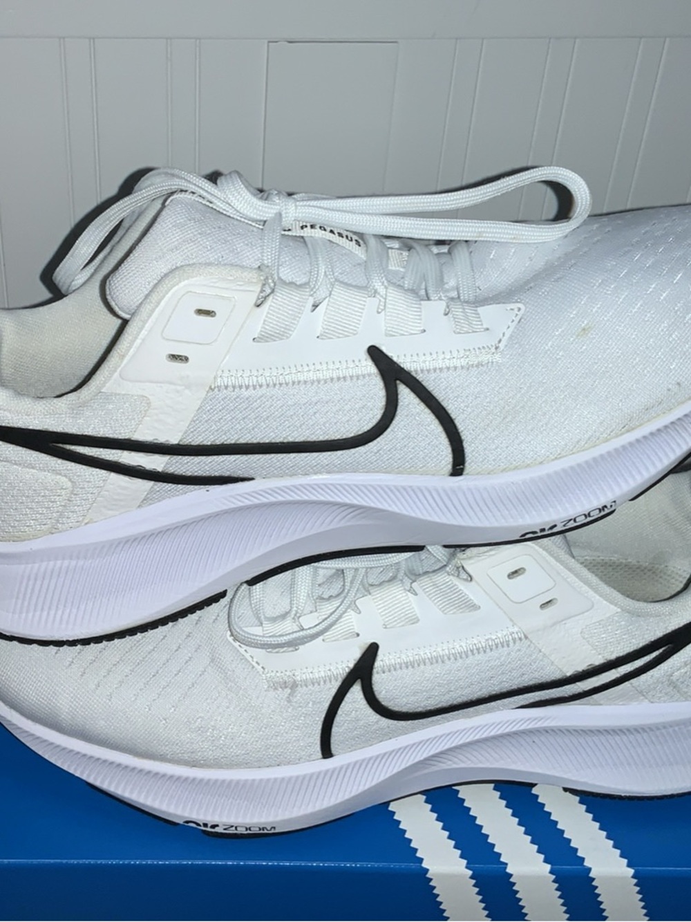Nike White Running Shoes with Black Swoosh